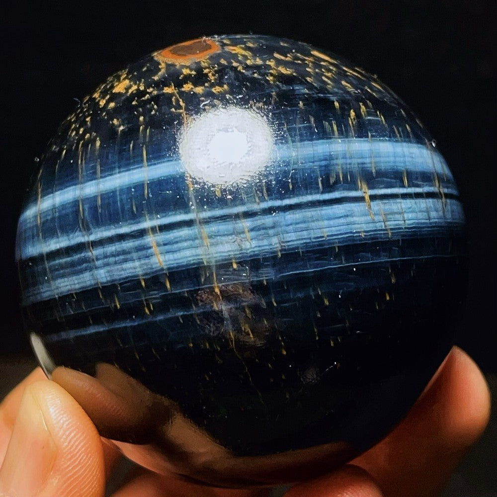 Sphère de cristal de quartz œil de tigre bleu météore naturel de 360 g